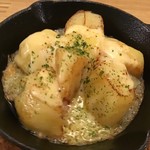 Baked potato with butter and cheese