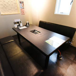 A spacious semi-private room for up to 6 guests.