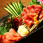 Two types of horse meat sashimi - marbled and lean -