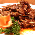 西安刀削麺酒楼 - 一本食べたら止まらない！麻と辣の効いたラム肉の串焼！
