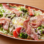 Caesar topped with hot spring egg and Prosciutto (large)