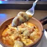 フランス田舎料理の店 ビストロ ベズ - 三元豚ホルモンとトマトとポテトのグラタン税込980円