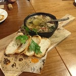 ヒロ ムネトモ - タコのアヒージョ。