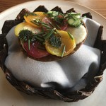 noma - flatbread with medium rare cooked vegetables