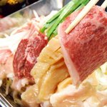 藤丸 - 名物☆チリトリ焼き　神戸牛もつをどっさり投入！！味噌ベースの看板メニュー！コースでもどうぞ♪