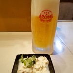 居酒屋 あがん - お通しのゆし豆腐とオリオン生ビール