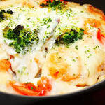 Grilled seafood with sea urchin sauce and cheese