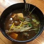 小魚料理 とみ助 - 虎魚のアラは赤だしに