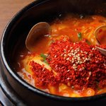 炭火焼肉 日本橋イタダキ - 激辛『爆』も人気のチゲ鍋