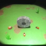 201 - ﾃｰﾌﾞﾙ演出：原始人が石のお金で拝んでいます