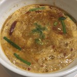 味世 - 台湾ラーメンのおじや　玉子が辛さをマイルドに!!