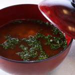 Miso soup with green seaweed and tofu