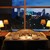 パノラミックレストラン ル・ノルマンディ - 内観写真:夕景のみなとみらいを望むソファ席