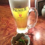 さば銀 - 生ビール。お通しは鯖のみぞれ和え