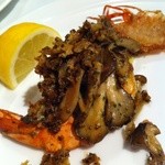 エスペランザ - 有頭エビの香草焼きとエビ足のせんべい
