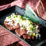 Sashimi with green onion and horse ribs