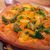 コシニール - 料理写真:恵那鶏のミンチと菜の花のピッツァ