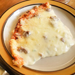 トニーズピザ - たっぷりチーズのピザ