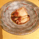 大喜寿し - タコの柔らか煮　確かこれも夫が待ちきれず一切れつまみ食いの後の写真