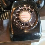 麺や横丁 縁日 - レジ横の電話