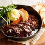 Beer-braised Cow tongue served with baguette