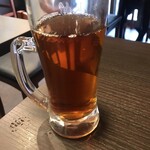 肉もつ屋 神坊 - 烏龍茶。混みです