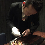 USHIMITSU - シャトーブリアンのカツサンドに生ハムを擦ります。