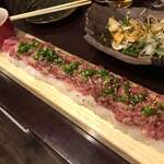 肉ろばた 肉の寿司 carne - 料理写真:ながーい和牛ユッケ