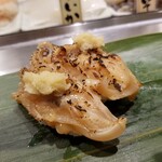 寿司 魚がし日本一 - 焼きゲソ。