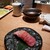 藁焼きと茶碗蒸し 横浜魚金 - お通し（鮪握り）