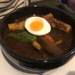 スープカリー専門店 元祖 札幌ドミニカ  - カレー　黒、具　豚、辛さ　4、ご飯　中、トッピングにチーズをつけてました(写真にはなし)