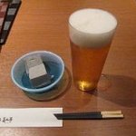 麻布十番高山亭 - 付き出しの豆腐のお皿がお洒落でしょう。生ビールはクーポンサービスです。