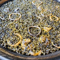 ミゲル フアニ 新宿タカシマヤ タイムズスクエア店 - イカ墨のパエリア。