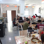 味坊包子 - 左：オーナーは売上の計算