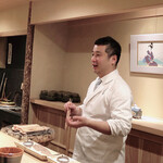 富小路 やま岸 - 蟹を焼く親方