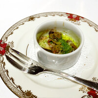 au deco - アミューズ（つぶ貝のエスカルゴバター）