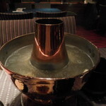 瀬里奈 - 　しゃぶしゃぶのスープで餅、くずきりなどを調理している様子です。