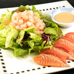 Aurora salad with shrimp and salmon