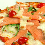 Grilled salmon and cheese pizza
