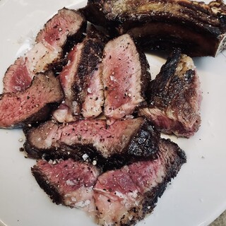 Bistecca (Florence-style Steak) grilled over charcoal