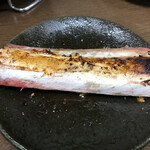 炭火焼肉 寿月 - ジャンボ骨付きカルビの骨。骨膜まで噛みちぎって綺麗に食べることが至極。記念に持ち帰ったりましない（笑）。