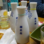 四ツ木製麺所 - トミさんアイデアの各銘酒は輪ゴム印