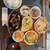 風雅堂 - 定食￥1000 天ぷら、ステーキ、切り干し大根煮、キャベツの浅漬け、糠漬け、すじ煮込み、サラダ。天ぷらはりんご、さつまいも、かぼちゃ、えのき、ごぼう、タケノコ。天ぷらが盛りだくさんすぎてお腹いっぱい❤