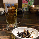 Tenkai No Robata - Hot pepperクーポン「お好きなドリンク1杯と炉端焼きセットで@1000」で注文した「生ビール(プレモル)」と、「お通し」@420(税込価格)