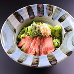 Seared Cow tongue tongue and aromatic vegetable salad