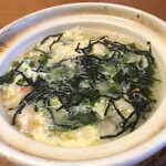 北海料理と旬の味 のむら - かに雑炊。妻が少しかき混ぜちゃいました(^^;