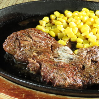 American Steak will be served on a piping hot iron plate.