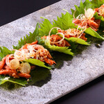 Seared beef with miso and shiso-wrapped canapes