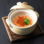 Earthenware pot rice with salmon and salmon roe