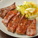 A Grilled beef tongue set meal (4 pieces) with rice, oxtail soup and pickles